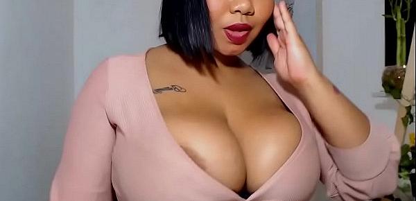  Busty ebony babe N4TYD0LLL20 shows tits and shakes ass in tight shorts